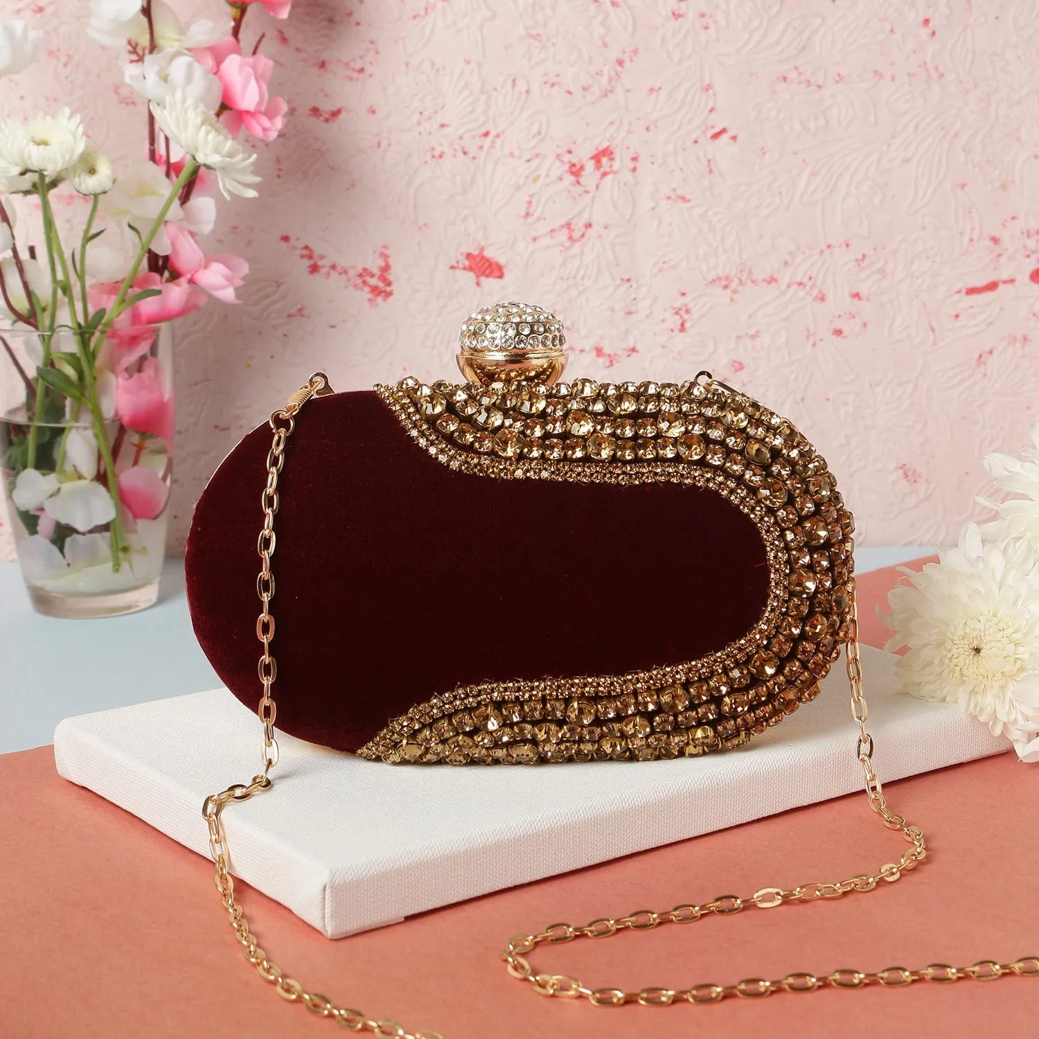 Crystal inspired oval embroidered clutch